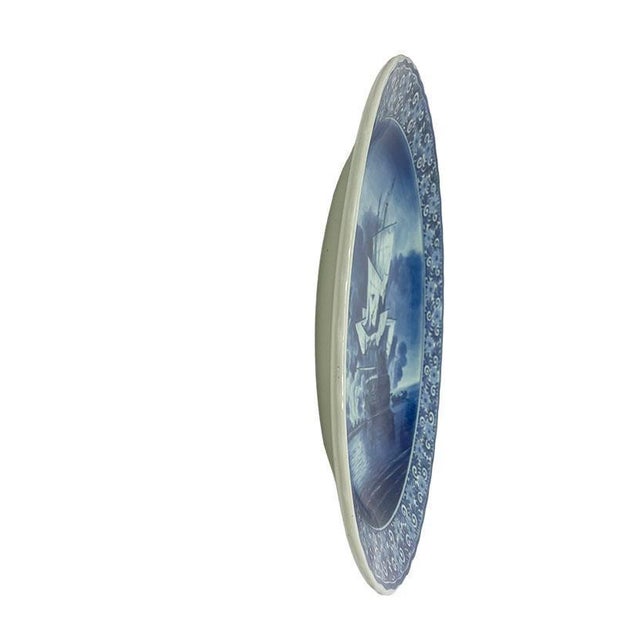 A zenith delft blue plate "the cannon shot" by willem van de velde a delft blue plate with a seascape based on the...