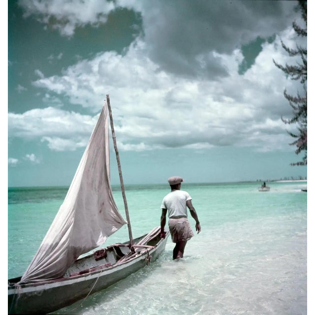 Jamaica Boat by Toni Frissell Local sailboats on the turquoise waters of the sea in Jamaica, 1948. (Photo by Toni...