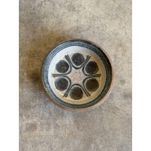 Vintage 1960s Danish Mid-Century Modern small ceramic bowl showcases an exceptional abstract design from the historic...