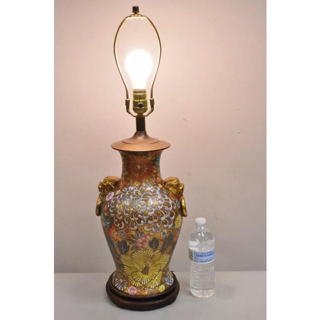 Vintage Chinoiserie Orange Porcelain Ceramic Foo Dog Table Lamp. Circa Mid 20th Century. Measurements: 28" H (to finial) x...