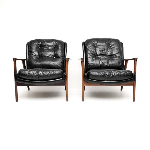 An absolutely stunning and very rare pair of vintage Swedish armchairs in leather by Inge Andersson. The model is called...