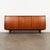 The sideboard was made in the 1970s at the Danish manufactory PMJ Viby J. The structure is covered with teak veneer. The...