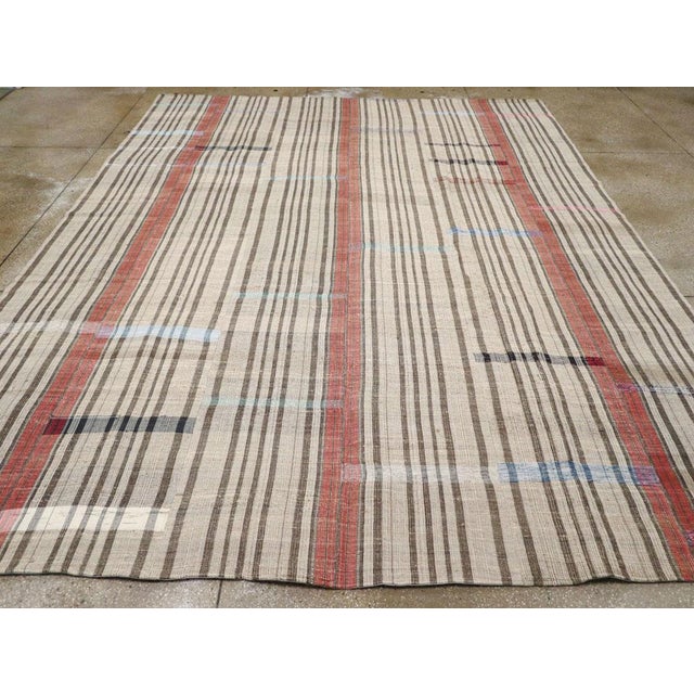 A vintage Turkish flatweave Kilim room size carpet handmade during the mid-20th century. Measures: 11' 0" x 14' 0".