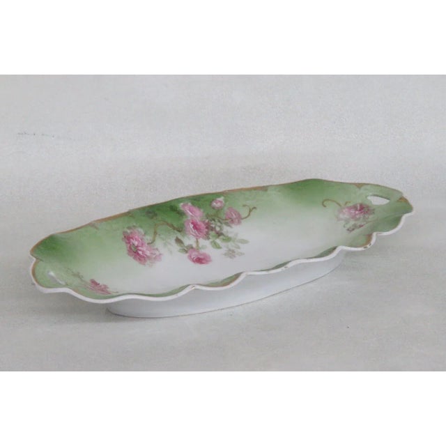 This charming porcelain serving tray is made of porcelain. This piece is stamped that it was made in Bavaria, Germany, see...