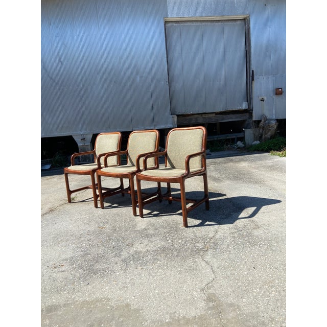 Set of Three Mid Century Modern Pretzel Armchairs. Perfect for a Dining or Conference setting. These chairs have a broad,...