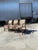 Set of Three Mid Century Modern Pretzel Armchairs. Perfect for a Dining or Conference setting. These chairs have a broad,...