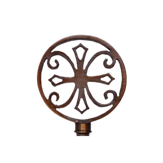 A pair of antiqued brass round filigree lamp finials with scroll details. Fits a standard size lamp harp. Dimensions per...