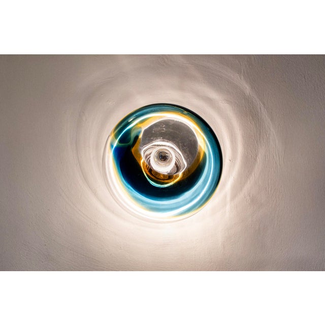 Wall lamp with metal base and colored Murano glass ceiling light. Made in Italy 1970s Up to 250V (Europe/UK Standard).The...