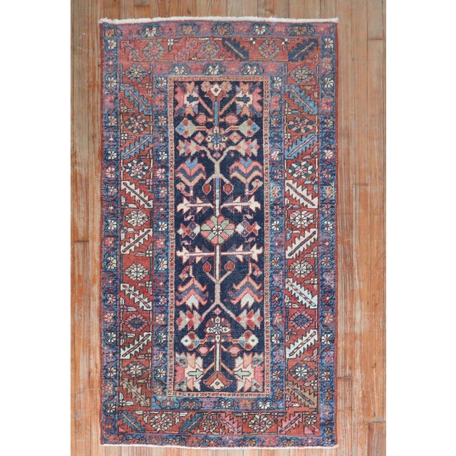 Antique Persian Heriz runner from the 2nd quarter of the 20th century with an all-over geometric motif on a navy blue...
