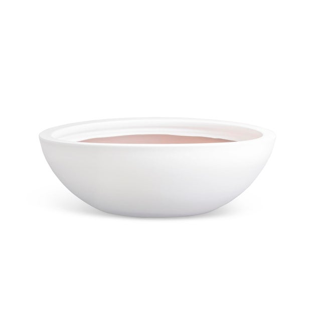 This durable earthenware low bowl is designed for the outdoors, but is equally as beautiful indoors. From the depth of the...