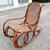 This is a magnificent rocking chair that embodies the timeless elegance of Thonet design, a symbol of bentwood...