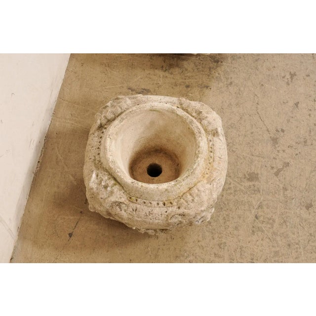 A pair of Spanish garden pots from the mid 20th century. This vintage planters from Spain have been created from cast-...