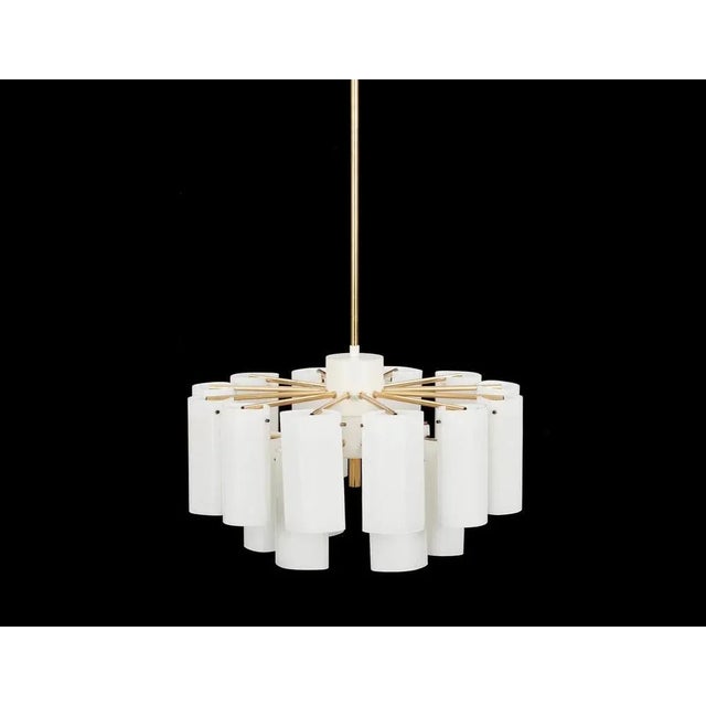 4 available. 18 armed, opaline glass and brass. Produced by Fagerhults, late 1960s. Height is adjustable after your...