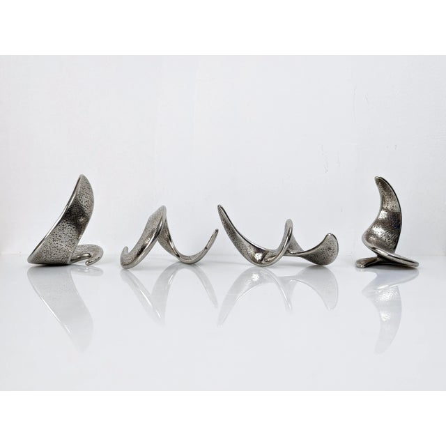 Very interesting set of sculptures with curved spiral shapes signed by the artist, numbered and dated. Each sculpture was...