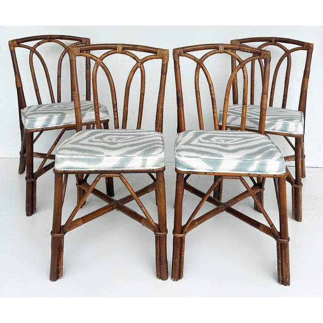 Vintage Coastal Rattan Side Chairs with Upholstered Seat Cushions, Set of 4 Offered for sale is a set of 4 vintage coastal...