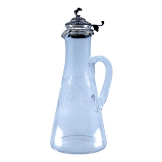 Glass Water Jug with Knob Cut Out on the Silver Lid For Sale