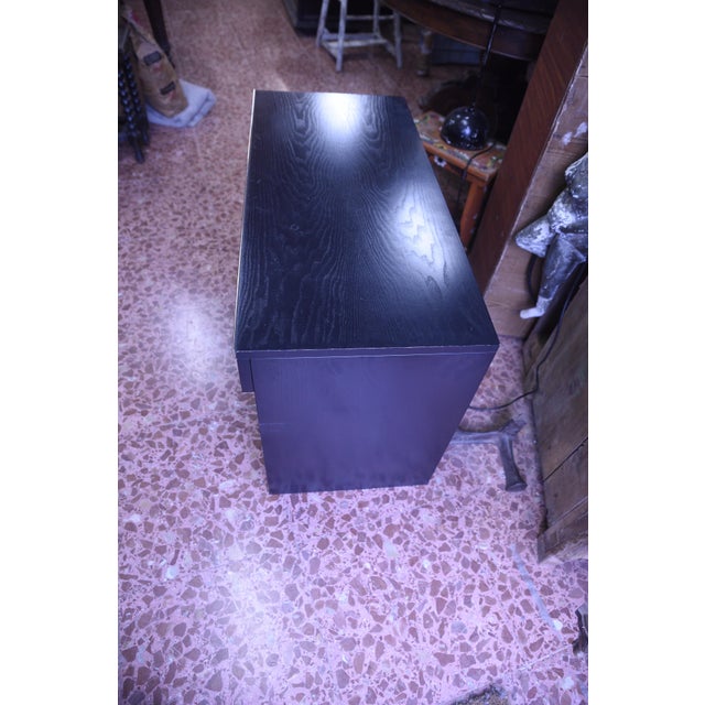 Dressing table 80's in black wood with internal mirror under the top openable and object compartment in white hard plastic...