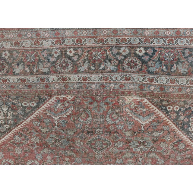 Distressed Antique Sultanabad Rug in Faded Red Background and Brown Border For Sale - Image 10 of 13