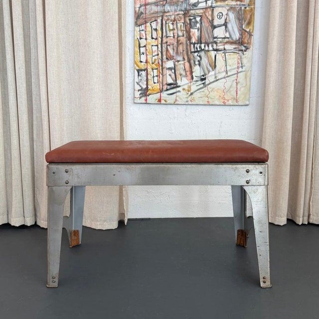 This custom bench seamlessly combines architectural poise with industrial sophistication for an impressive seating choice....