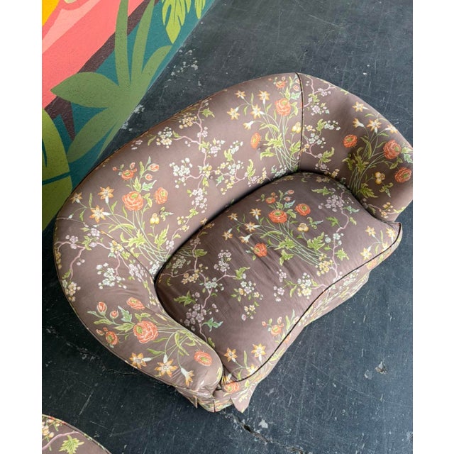 A great pair of Hollywood Regency petite loveseats! Down filled cushions, tufted back, bright floral pattern on a muted...
