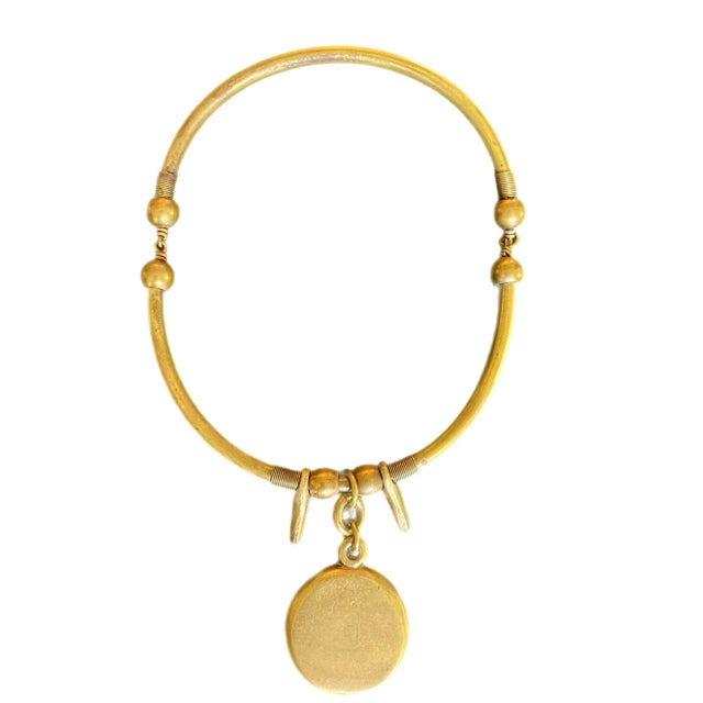 Artisan crafted necklace with curved bronze links terminating in a dangling dichroic glass round pendant. Hook clasp not...