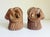 A pair of hand-carved wood ram's head or sheep's head sculptural bookends produced by Sarreid Ltd., made in Spain circa...