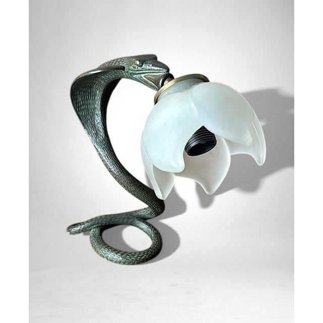 Refined and highly sculptural Italian Art Deco table lamp, crafted between 1930 and 1935, most likely in the Milan area,...
