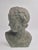 Sculpture / Bust of Eros - God of Love, in bronzed plaster. France, early 20th century. A copy of a bronze statue of Eros...