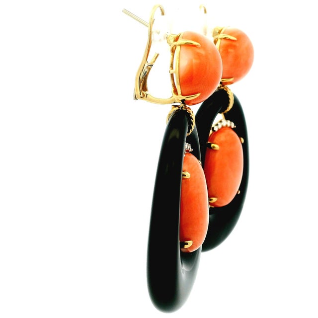 An extraordinary pair of vintage Italian statement earrings crafted in 18K yellow gold and designed with striking...