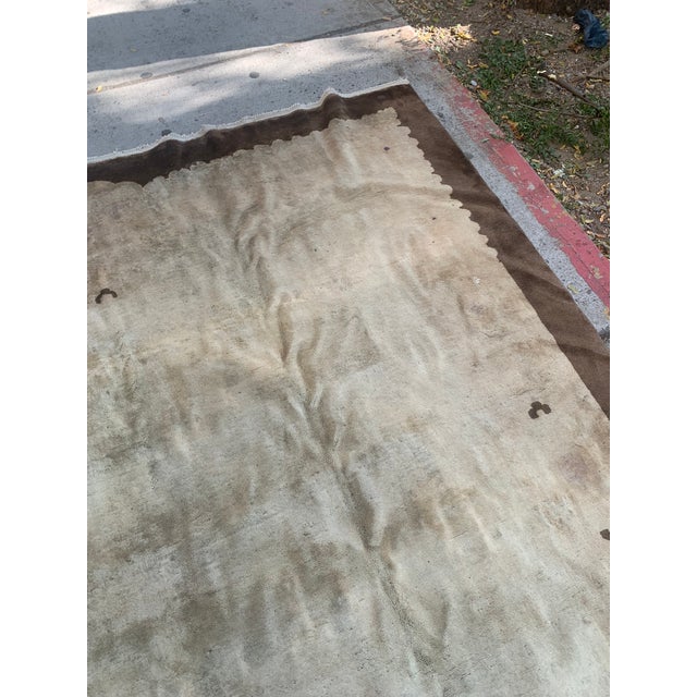 This handmade antique Peking Chinese wool rug, crafted in the early 1900s, is a magnificent example of traditional Chinese...