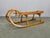 Original 1930s wooden sled from Czechoslovakia crafted in solid oak with iron fittings. This sculptural piece reflects...