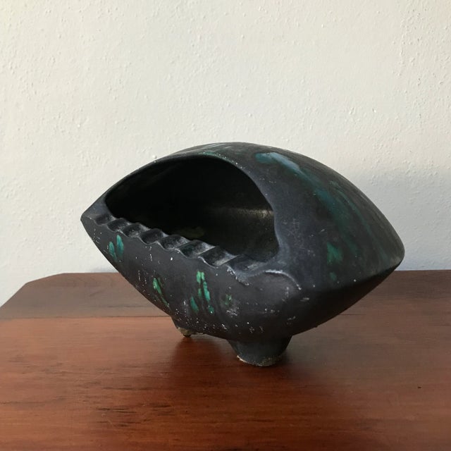 We love the glaze on this guy! Signed and dated in the bottom.