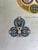 This etching reproduction depicts a number of beautiful vases and decorative elements from the 9th century. The title...