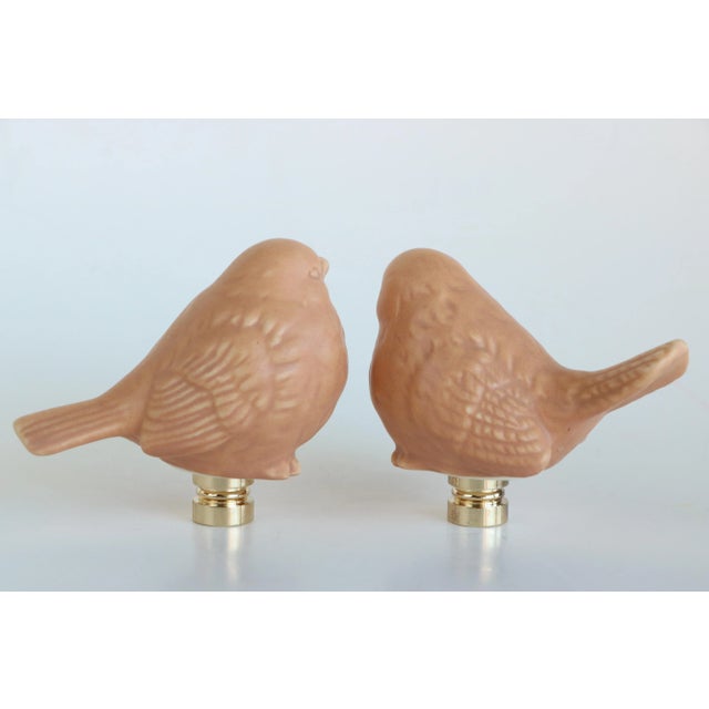 Update your current lighting or add a unique personal touch to your table lamps with a pair of designer lamp finials....