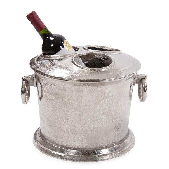 This wine bucket is a must have for any bar. A classic round aluminum shape is finished in a raw silver. It features round...