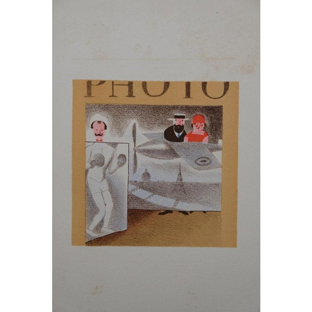 Lucien BOUCHER (1889-1971) Fairground Shops: The Photographer Original color lithograph On Arches wove paper, 18 x 22 cm...
