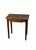A 19th-century walnut coffee table, characterized by slender proportions and a simple yet charming structure. The piece...