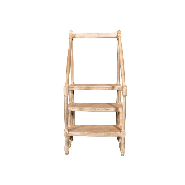 Neoclassical revival bleached walnut library steps. Three tiered step platforms and rectangular threads. Turned spindle legs.