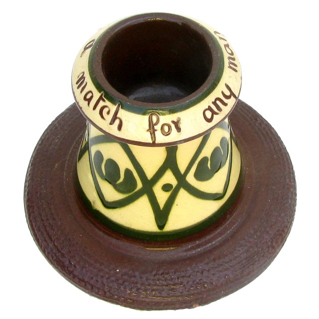 This charming match strike / vesta is lovely example of English Torquay red earthenware pottery. Decorated in the exotic...