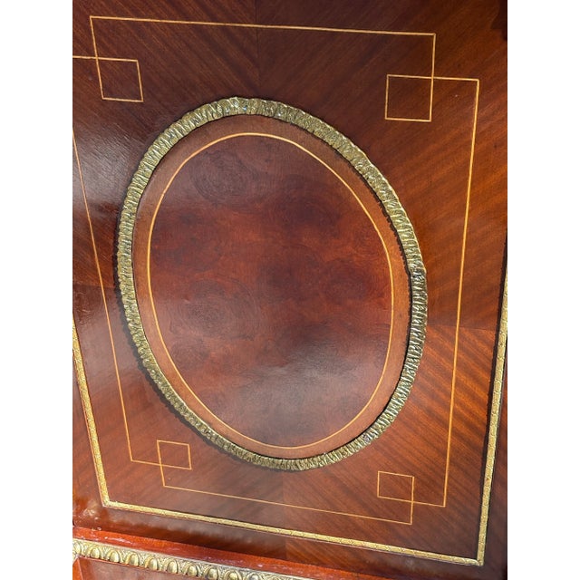 This Exquisite Early 20th Century French Louis XVI Style Mahogany Vitrine Buffet has Inlaid Satinwood Marquetry and Gilt...