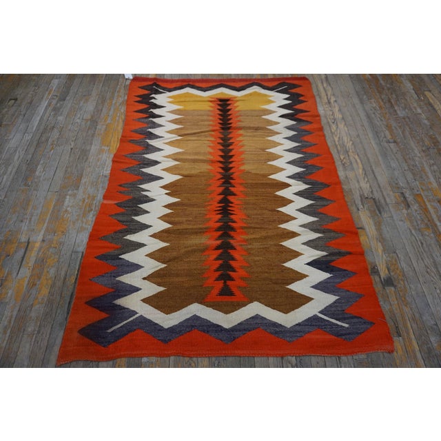 Antique Navajo Small Scatter Size Wool Camel Rug, Circa Date: 1925. This exceptional textile represents the peak of early...