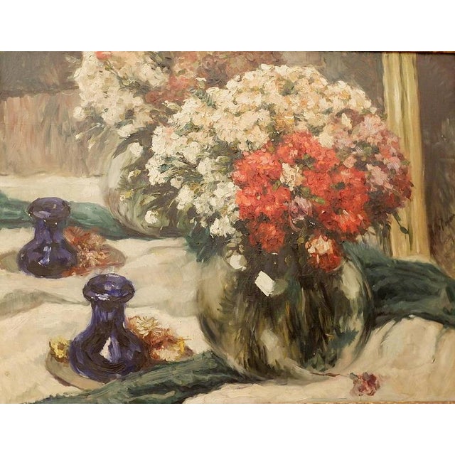 "Flowers in front mirror" painting on canvas 19th - signed Wear consistent with age and use. Measures : 90cmx70cm with...