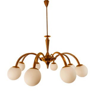 8-Light Brass Chandelier with Glass Spheres For Sale