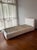 Merkurio single bed designed by Rodolfo Dordoni and produced by Flou in 2010. The structure has traditional shapes...