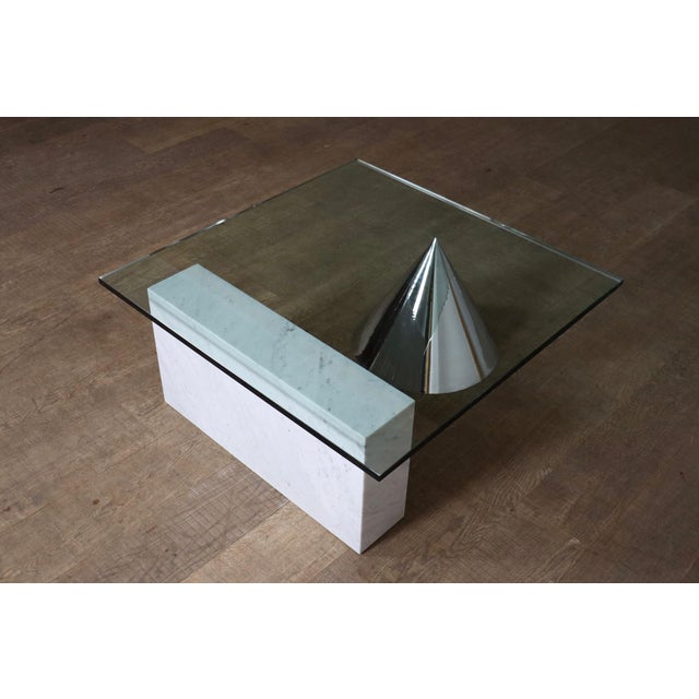 Kono coffee table designed by lella and massimo vignelli for casigliani, italy, circa 1984. the striking design is reduced...
