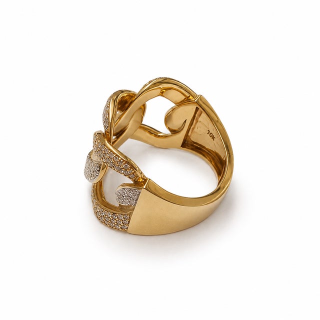 Bold and symbolic, this 10K Yellow Gold men's ring features an infinity-inspired design set with round natural diamonds....