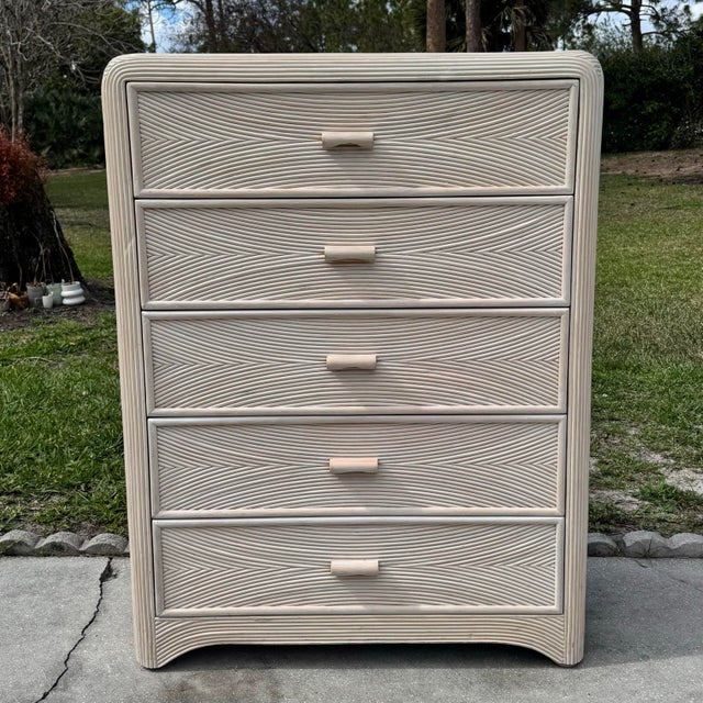A striking example of vintage Boho Chic craftsmanship, this highboy dresser is beautifully wrapped in sculptural pencil...