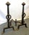 Large and stately pair of Addison Mizner andirons from the early 1900's. They are made of heavy hand forged wrought iron...