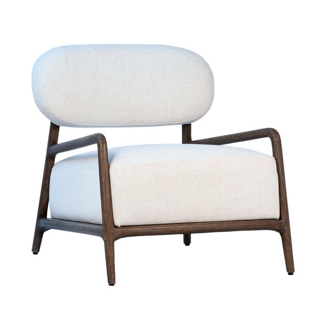 Modern reclaimed Mindi wood frame modern style arm chair with linen mix upholstered seat and back. Each may vary in exact...