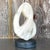 Add a touch of artistic elegance to your space with this Vintage Boho Carved Stone Abstract Sculpture. Featuring a unique,...